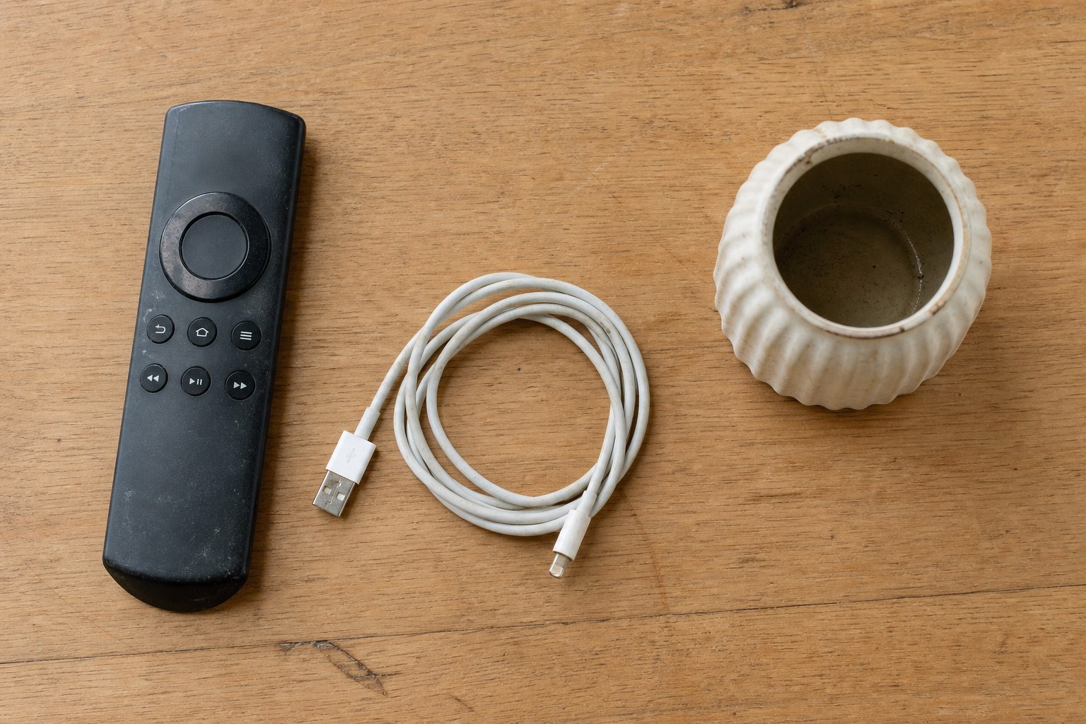 Everyday items arranged to compare condition and included accessories