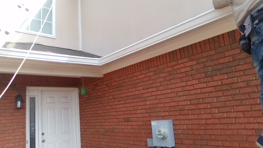 Gutter installation from a roof edge