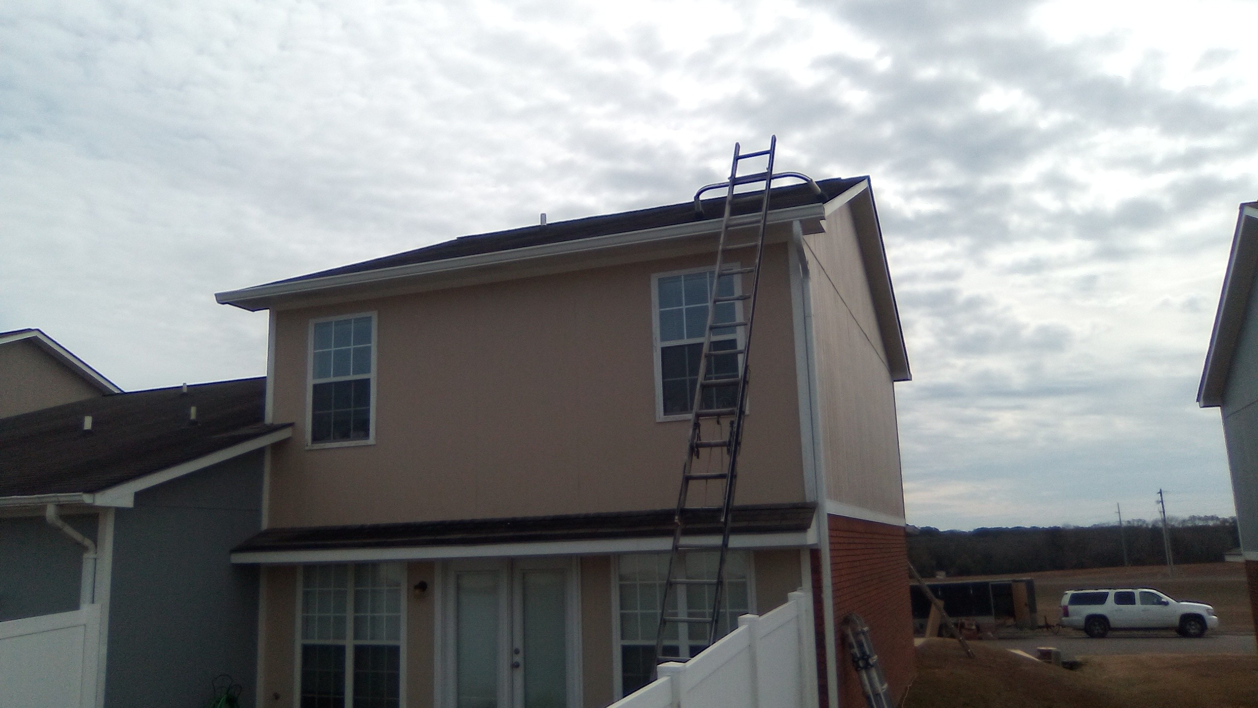 Gutter installation at a home exterior