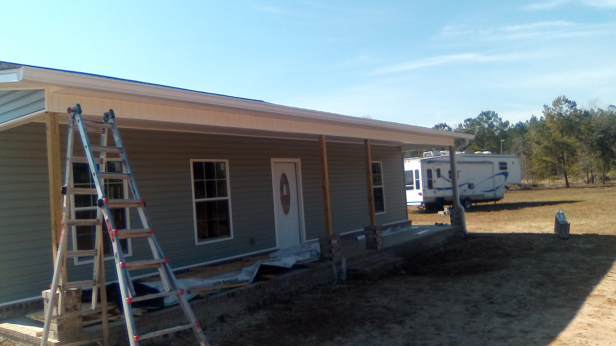 Gutter work across a covered porch