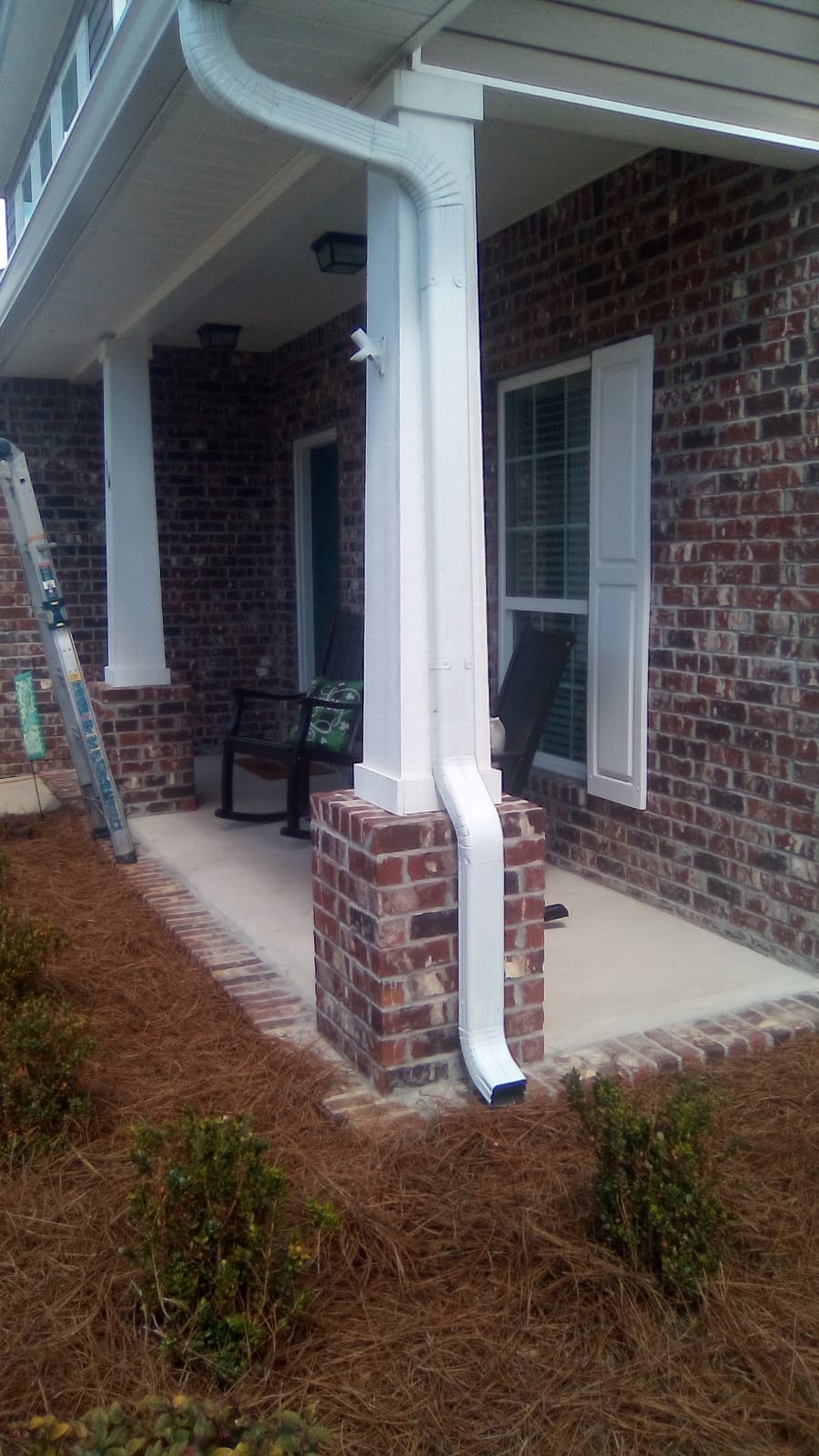 Completed gutter line along a roof