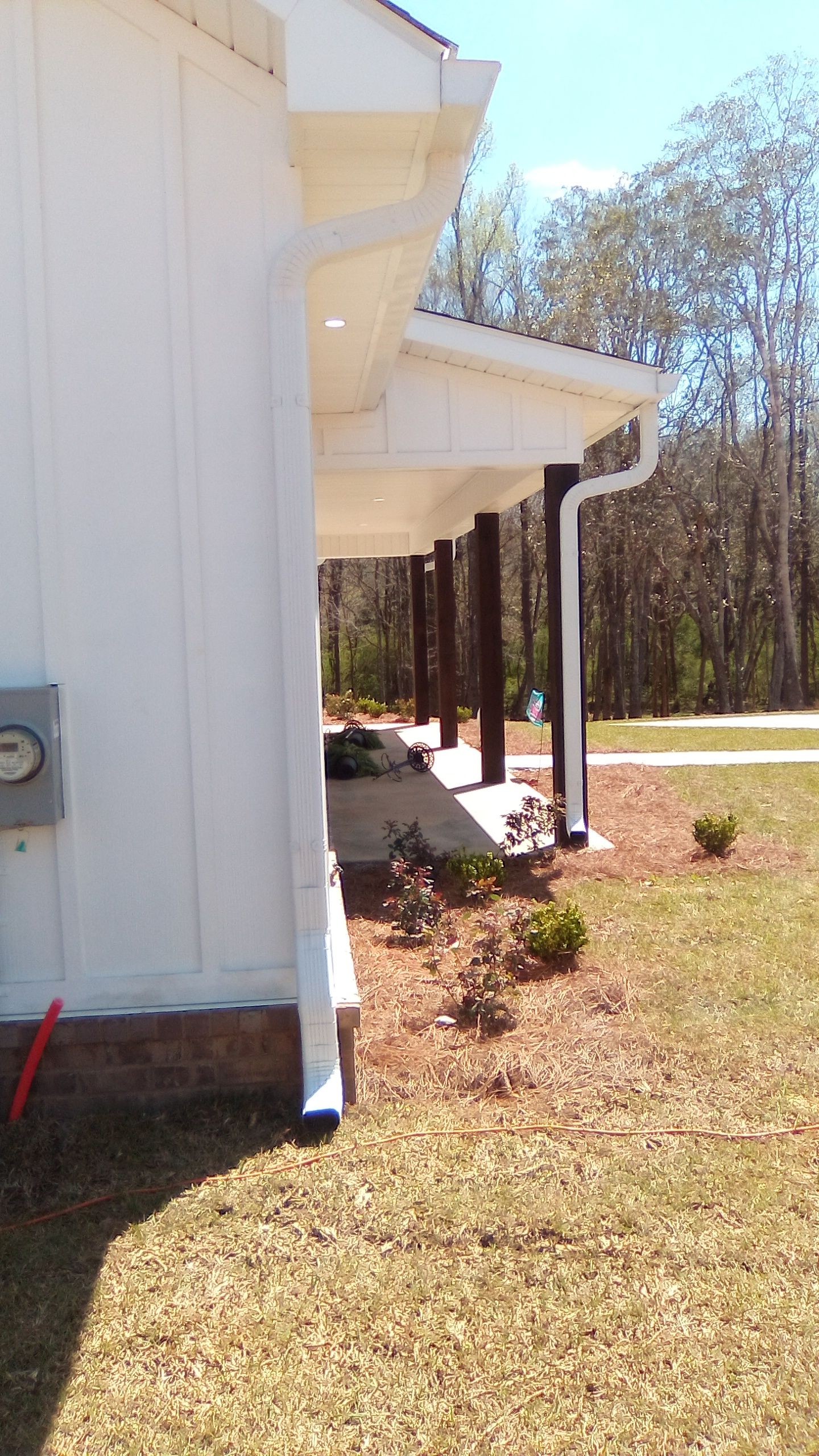 White seamless gutters on a residential home