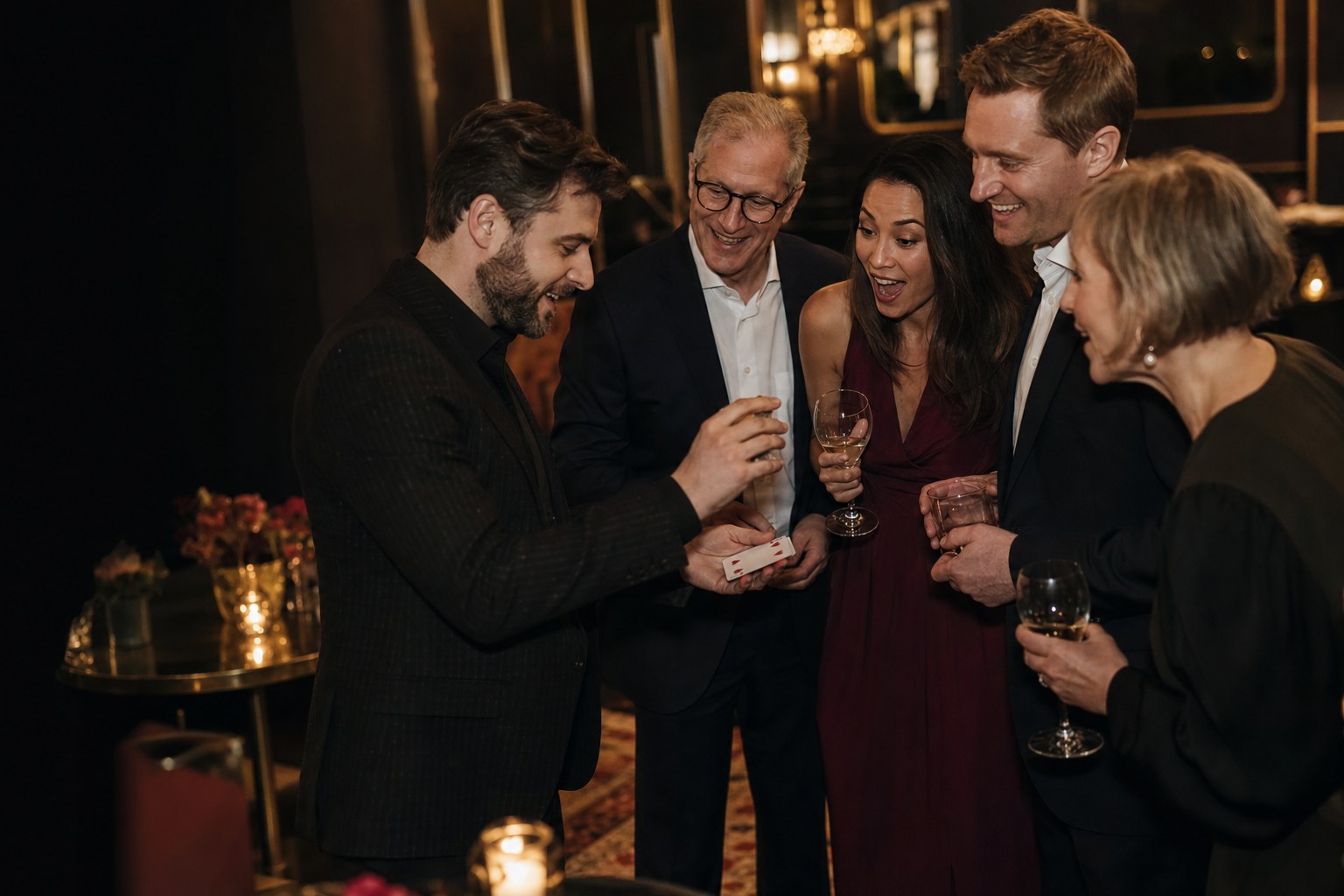 Guests enjoying close-up magic at a corporate reception