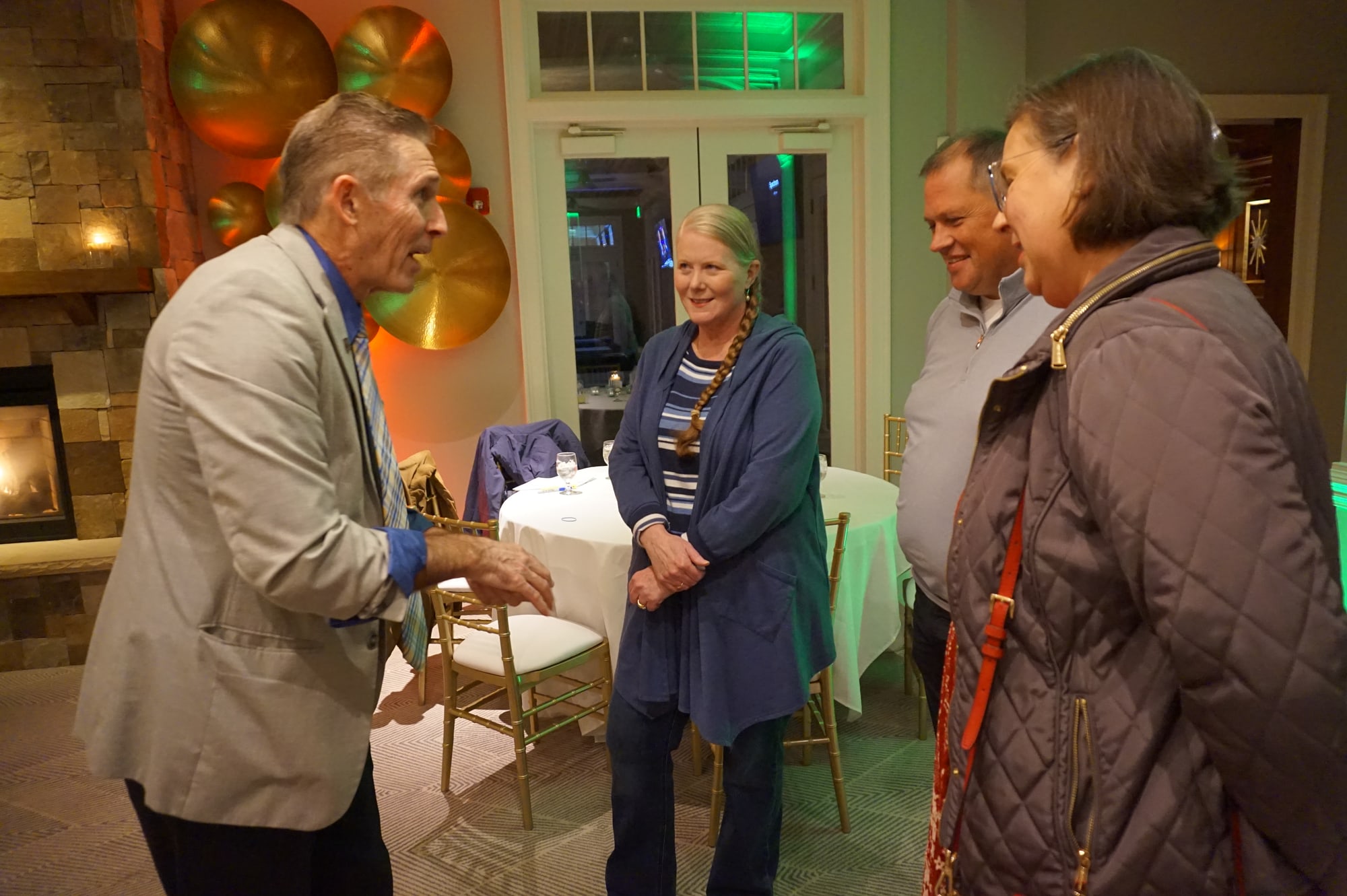 Zelnik entertaining a small group during an event