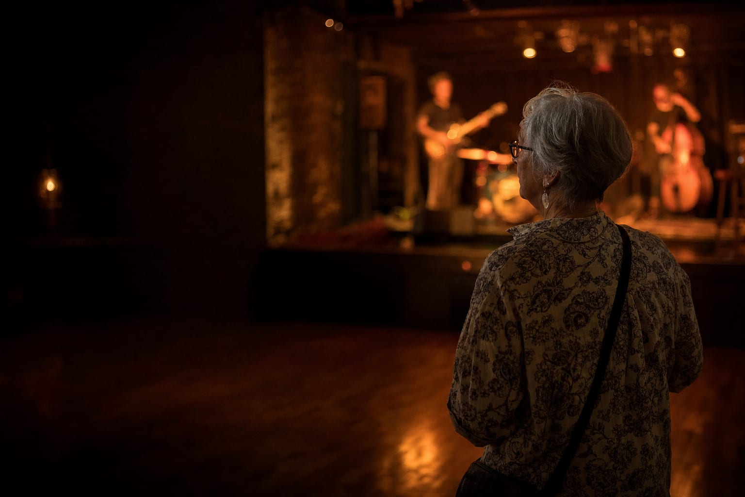 Woman enjoying a small live-music performance on her own
