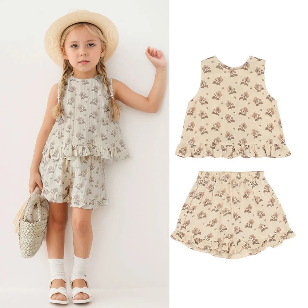 Soft baby clothing set in a pale pink and floral print