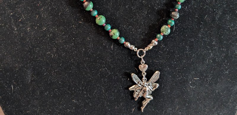 Handmade jewelry arranged for a colorful outing