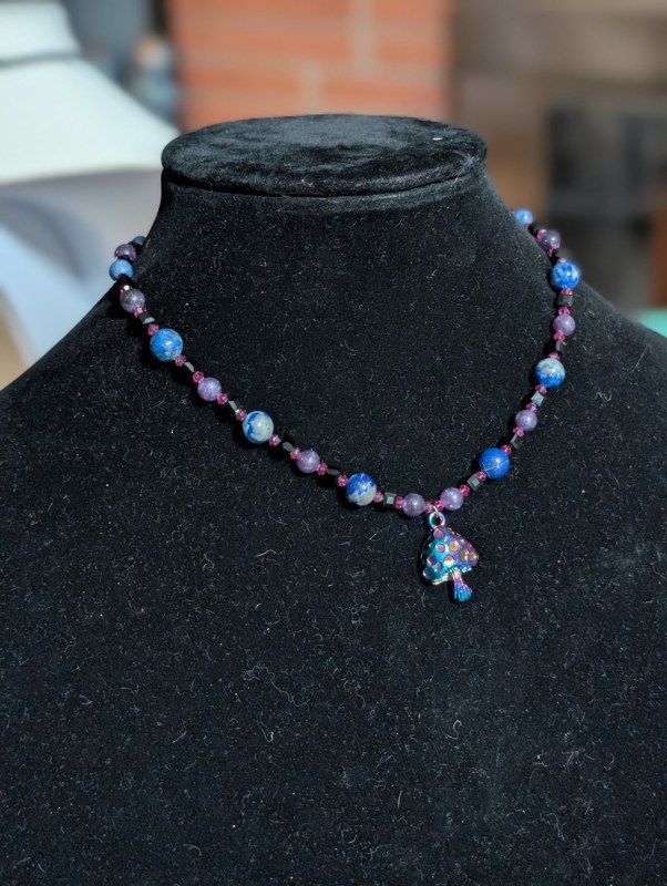 A handmade Fairlight necklace detail