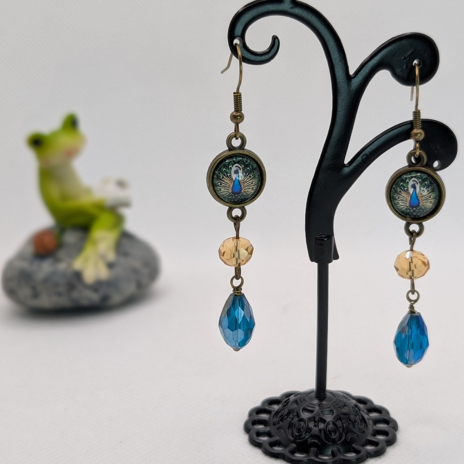 Miniature portrait earrings with faceted glass drops