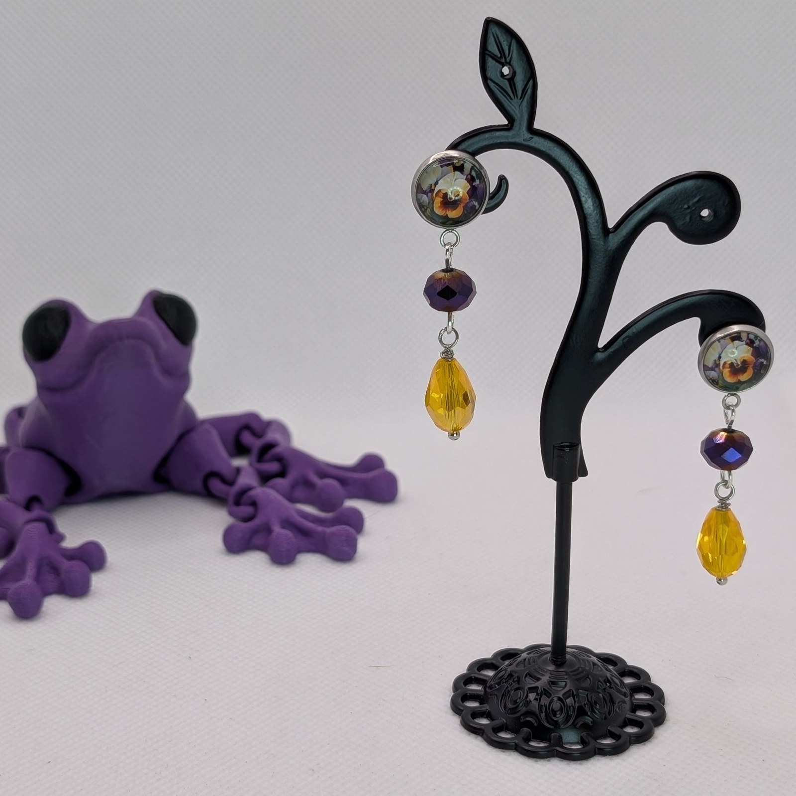 Botanical portrait glass drop earrings in purple and yellow