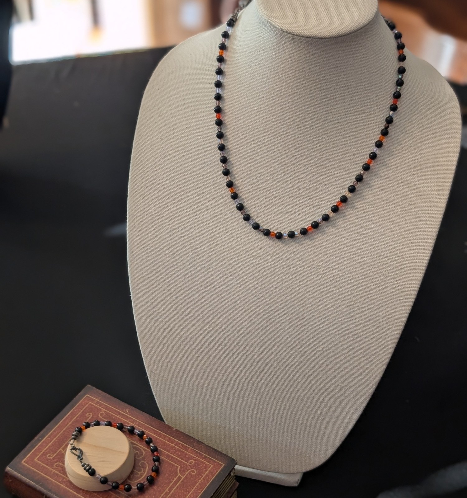 Black onyx necklace and bracelet set with colorful glass details