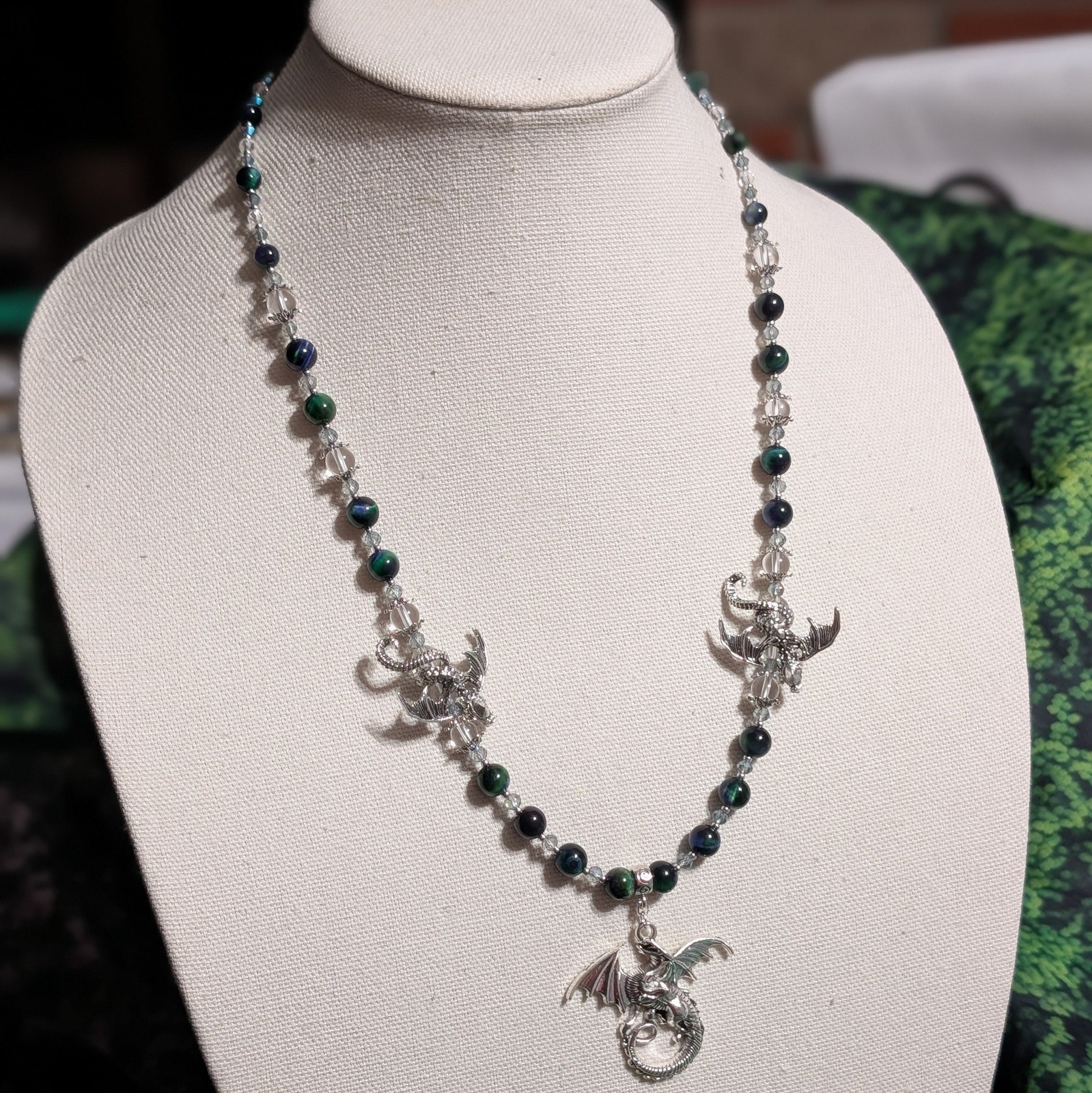 Green tiger's eye dragon necklace with silver-toned details