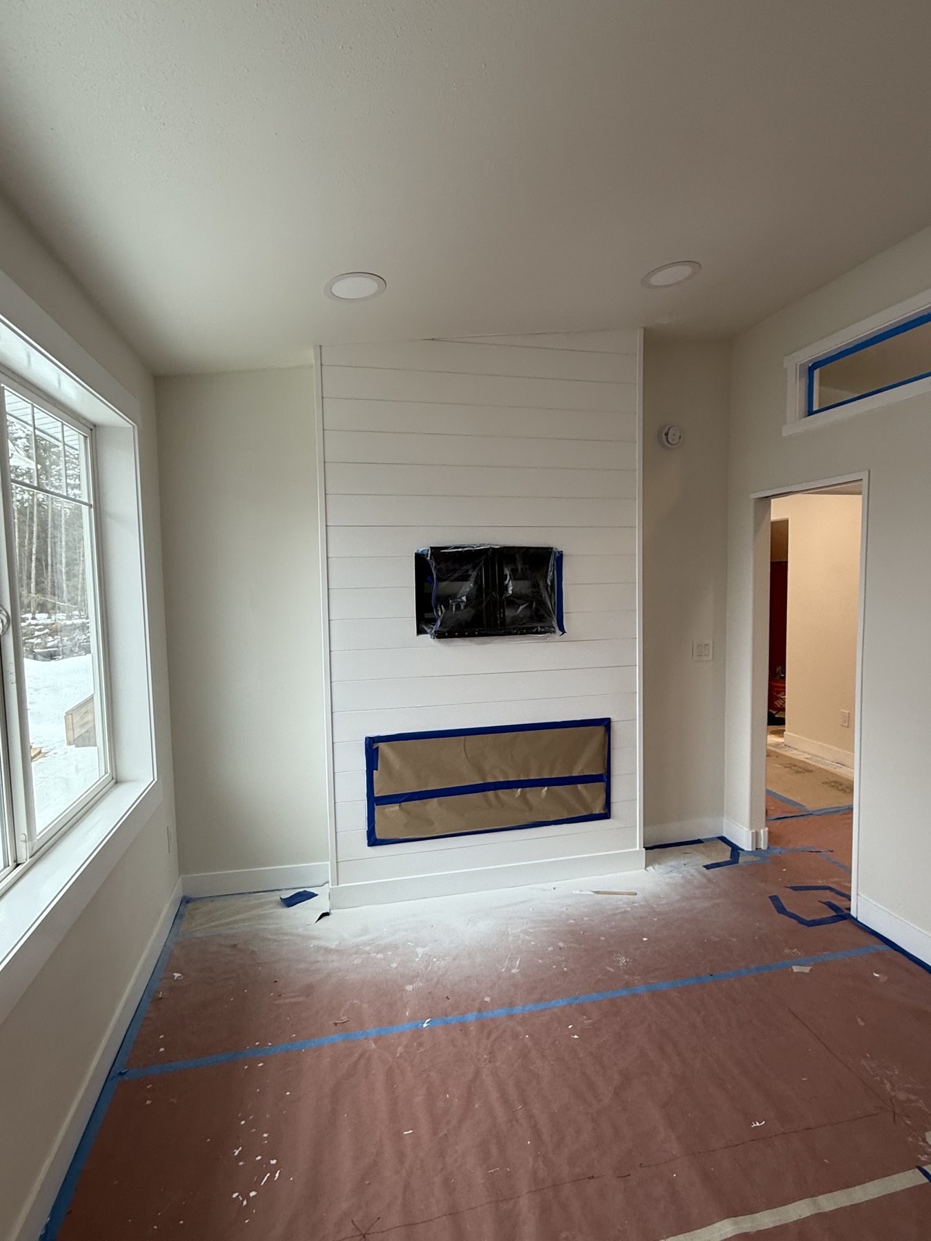 Living room finish work around a fireplace