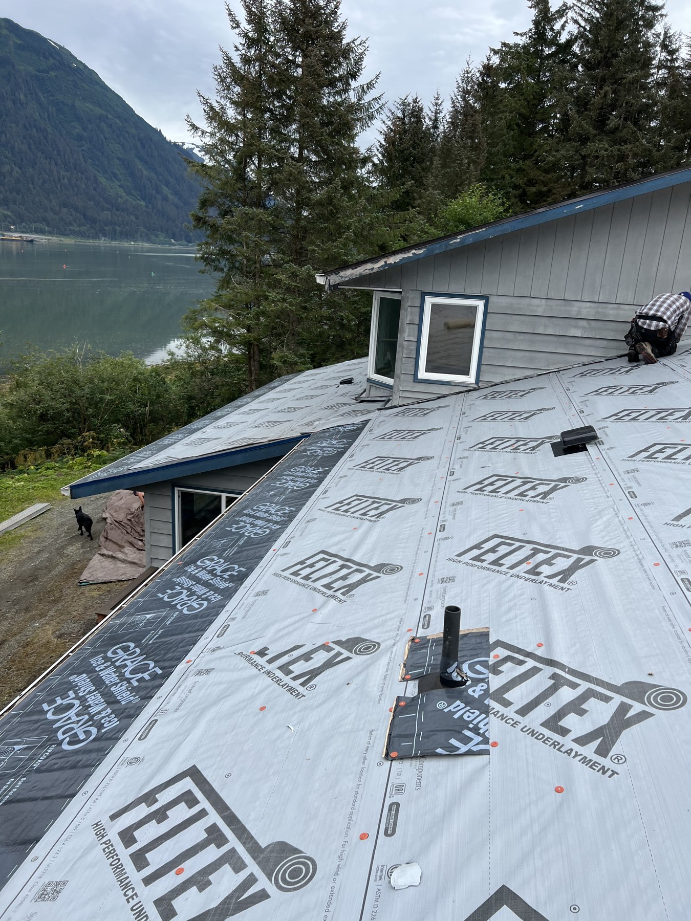 Roof underlayment and flashing during roofing work
