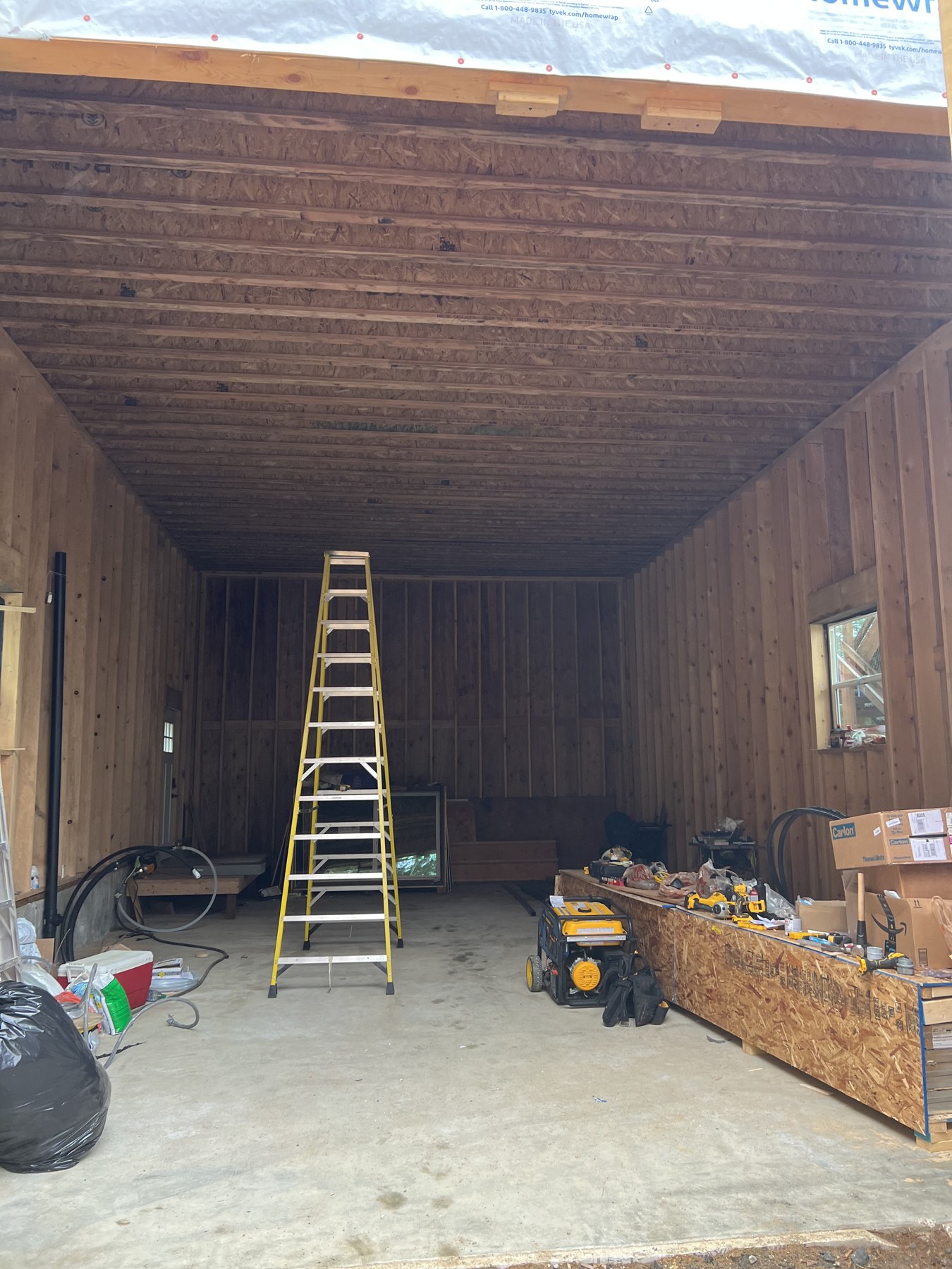 Interior framing and exposed wood ceiling during construction
