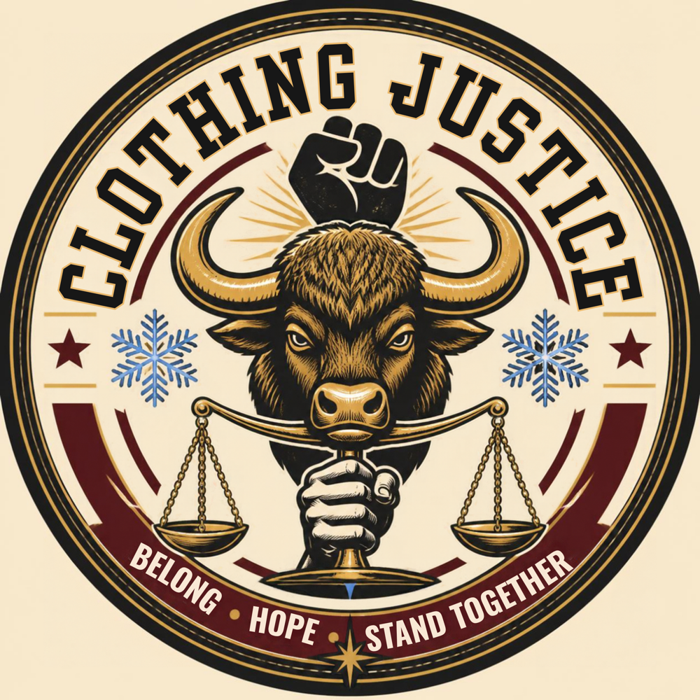 Clothing Justice cream and gold buffalo emblem with a raised fist and scales, and the words Belong, Hope, Stand Together