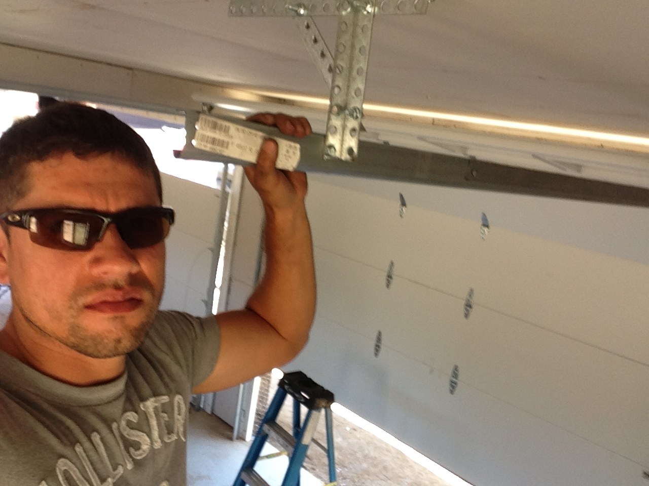 Garage door technician at work