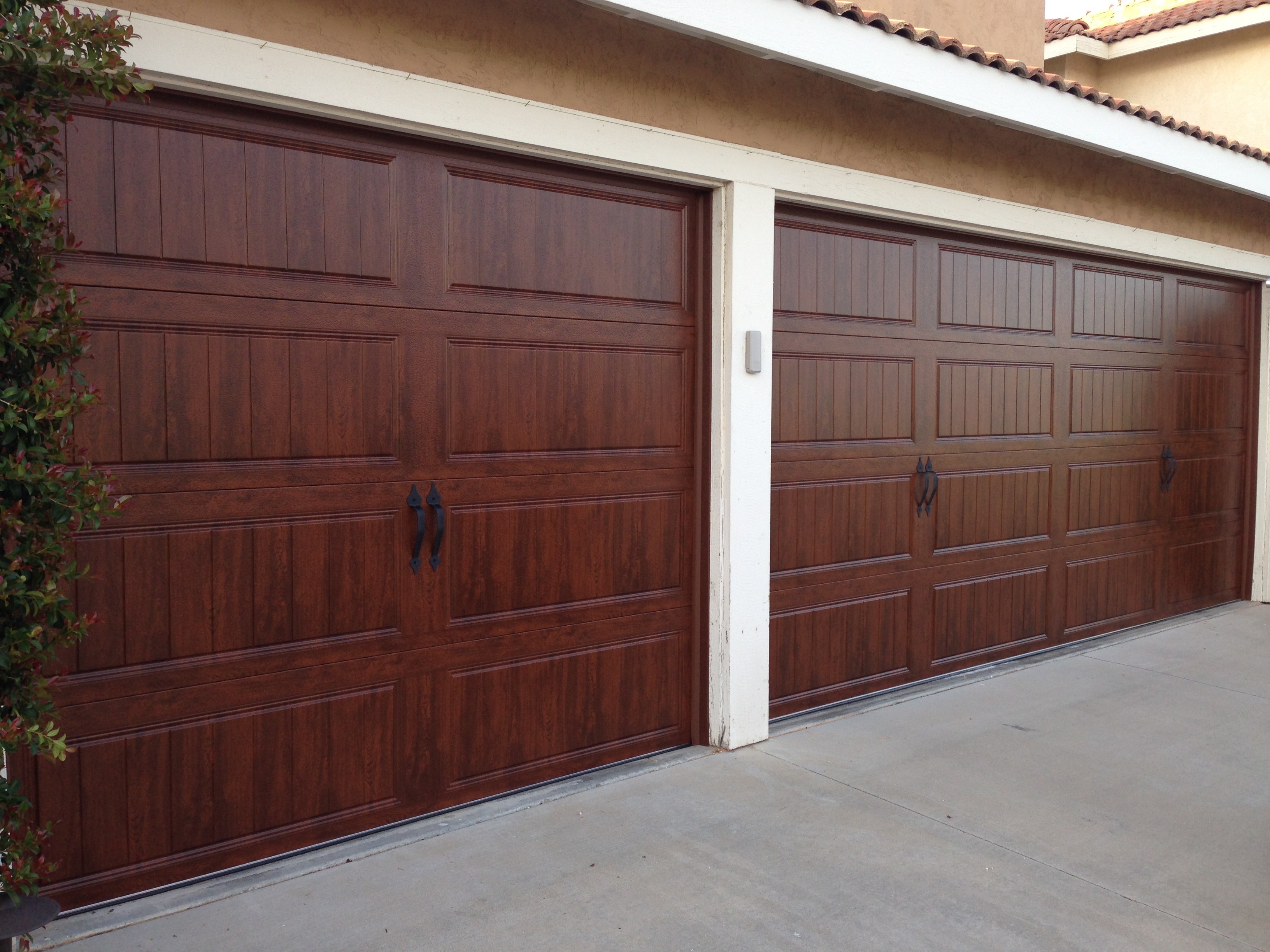 Finished double wood garage door