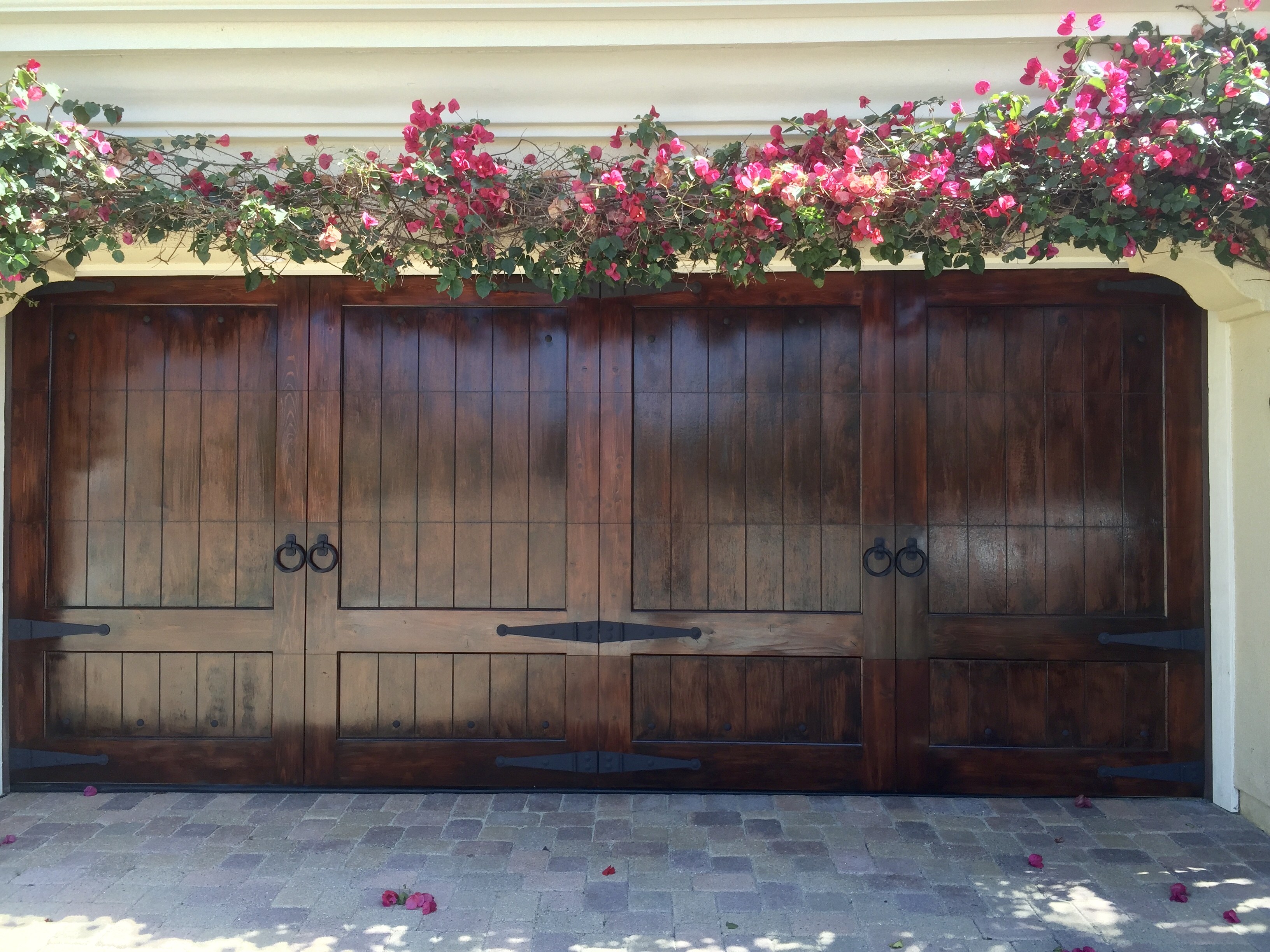 Wood garage doors with floral detail