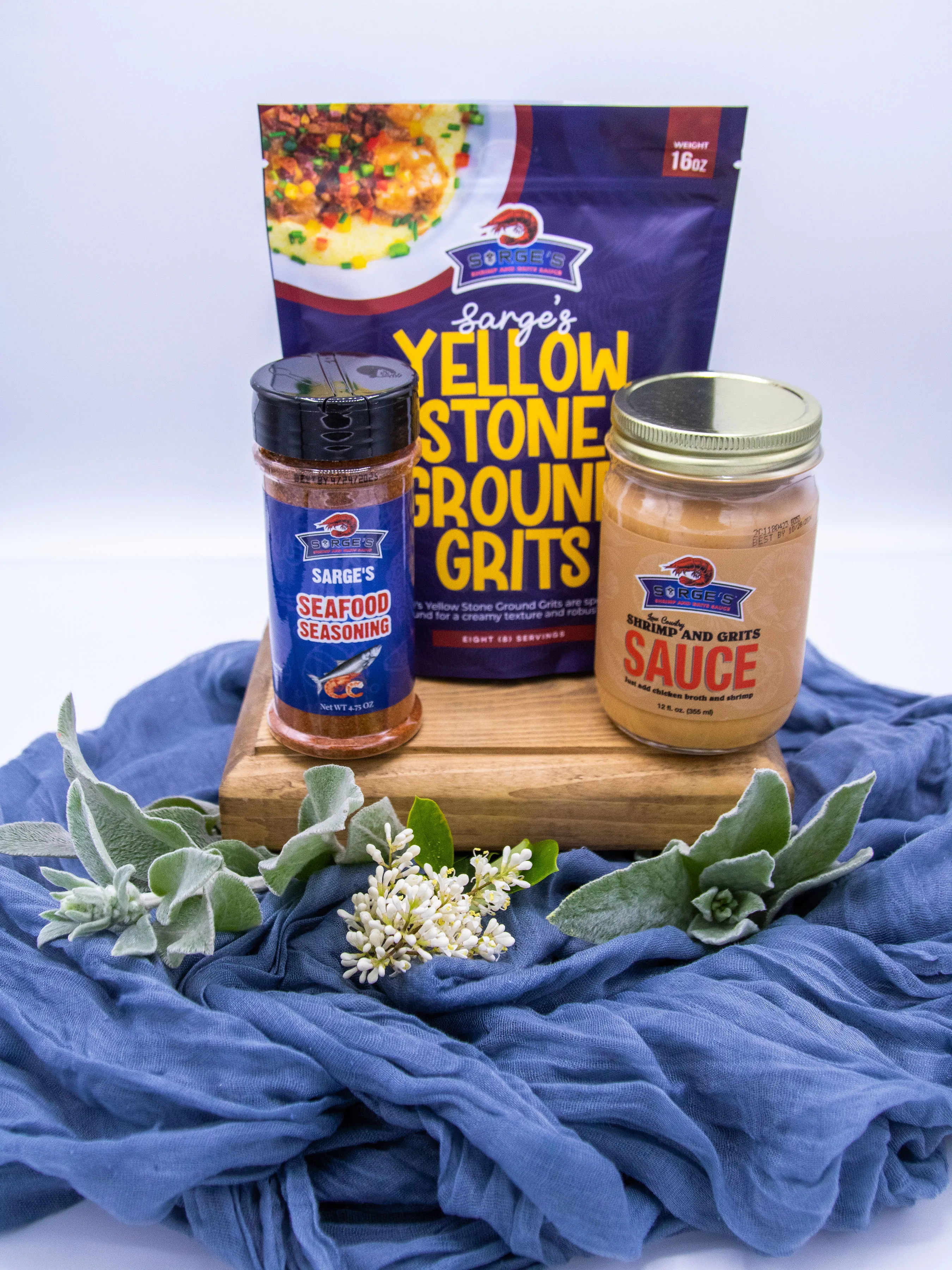 Sarge's sauce served over creamy shrimp and grits