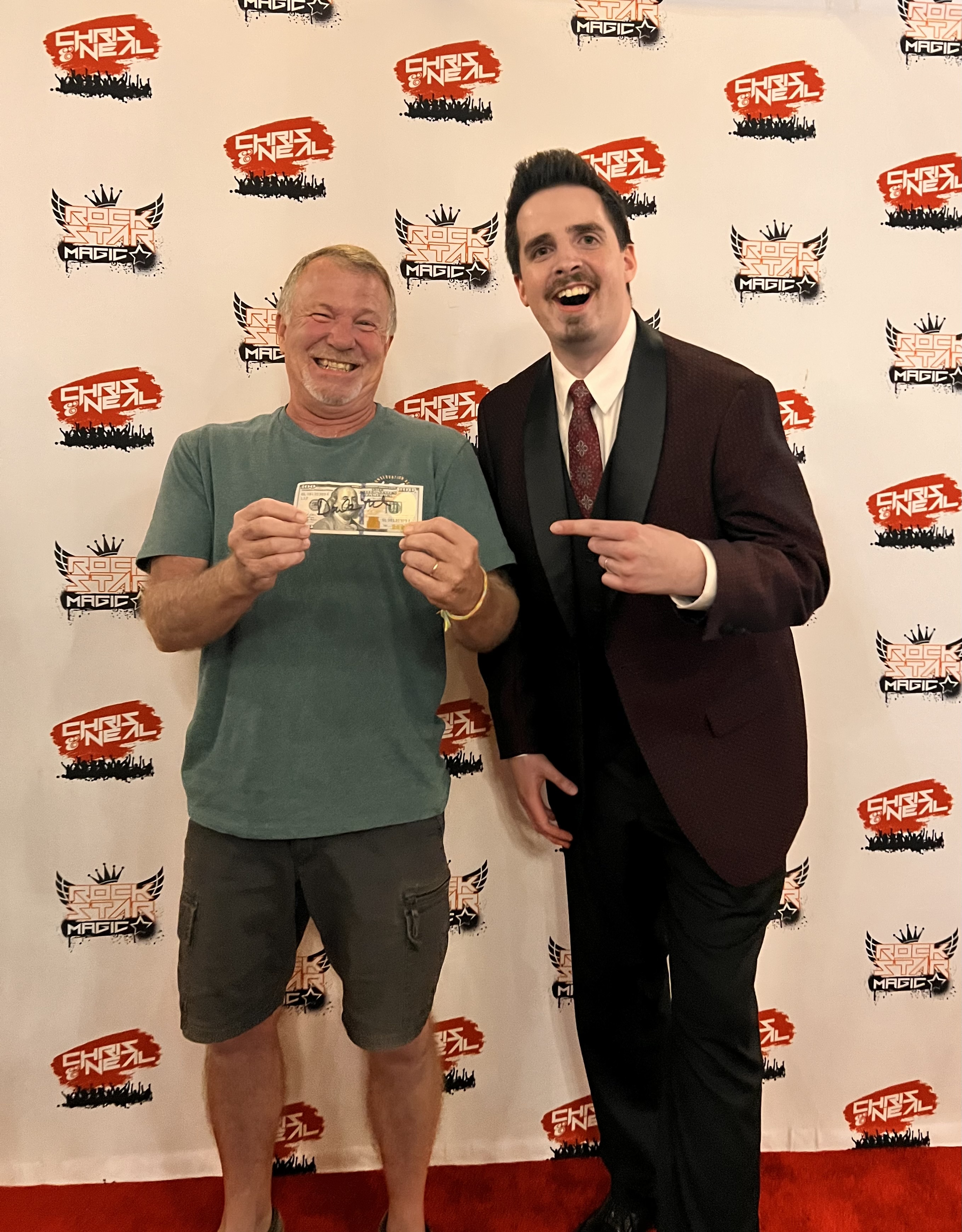 Neal Chamberlain performing close-up magic with event guests