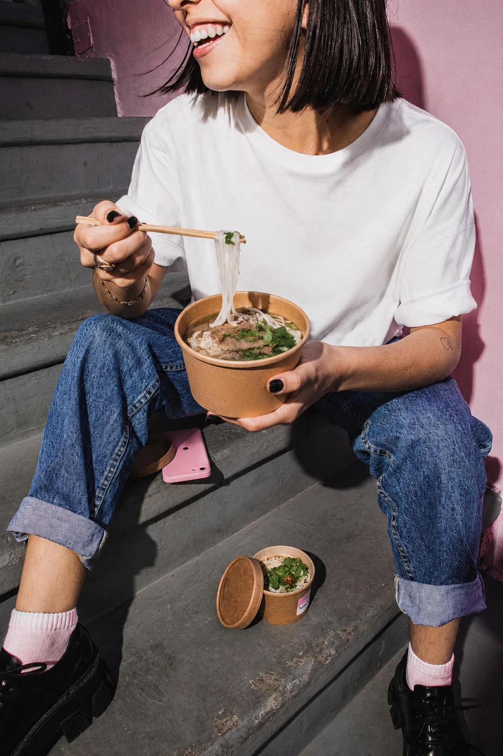 Fresh noodle bowl with vegetables prepared as a healthy school lunch option.