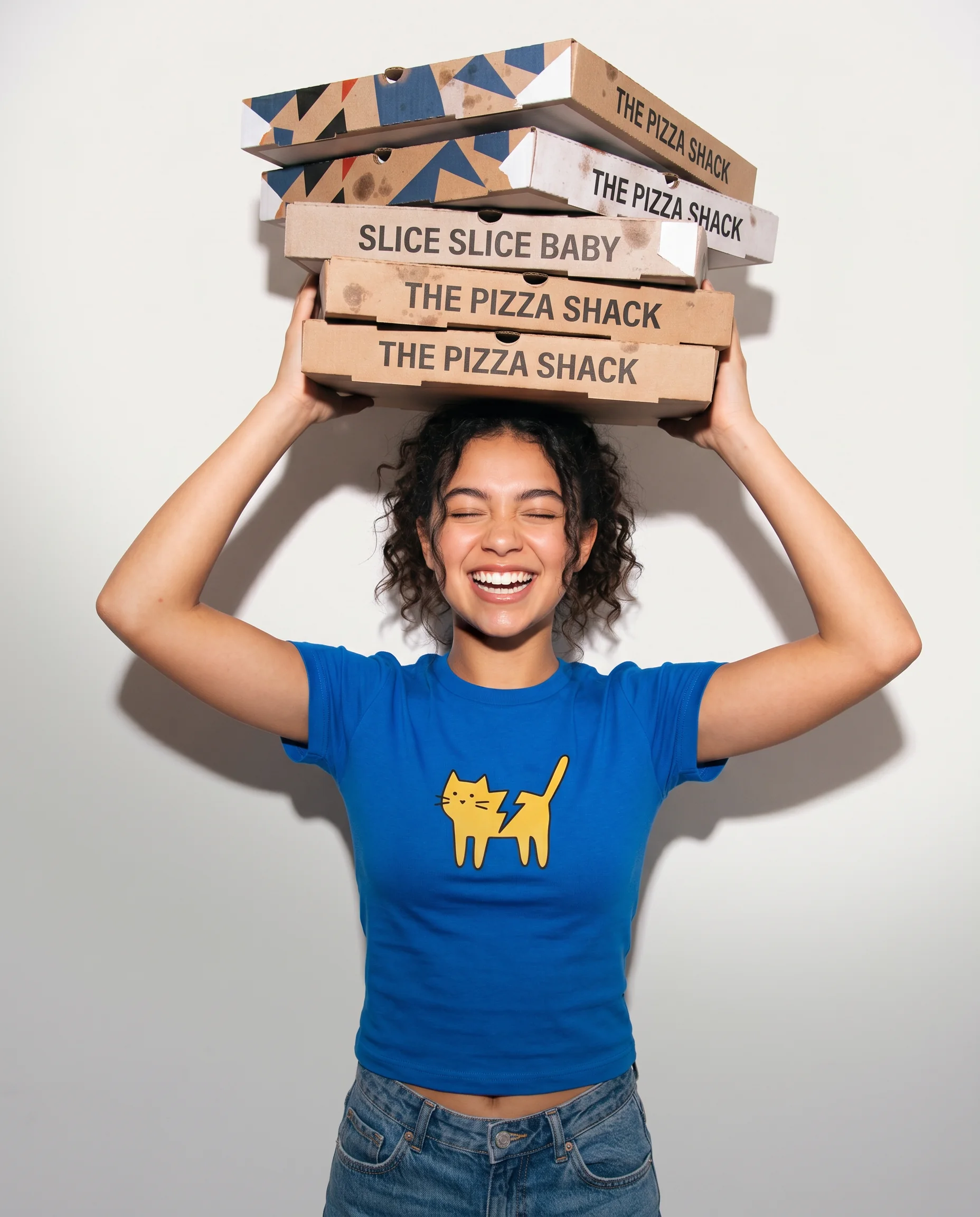 Student carrying a fresh restaurant-style school lunch box.
