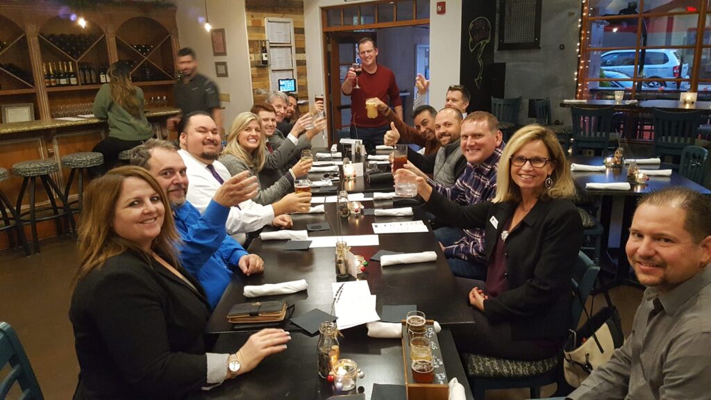 Business professionals talking at a networking event
