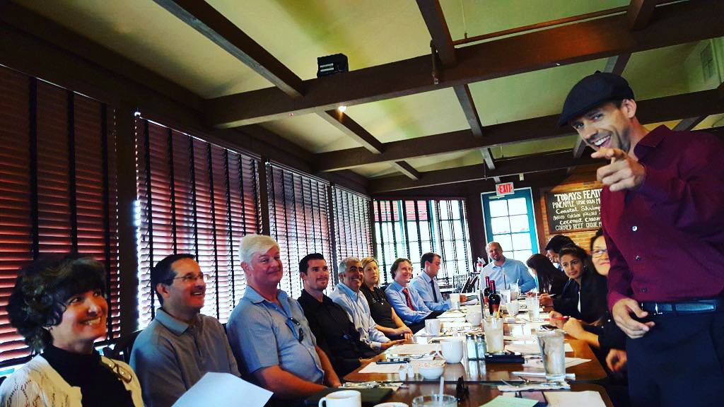 Business professionals talking at a networking event
