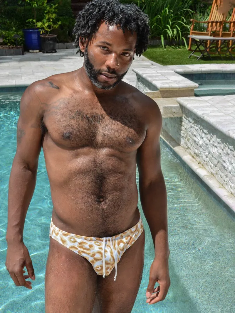 Model wearing patterned CecilAndEzra fitted swimwear