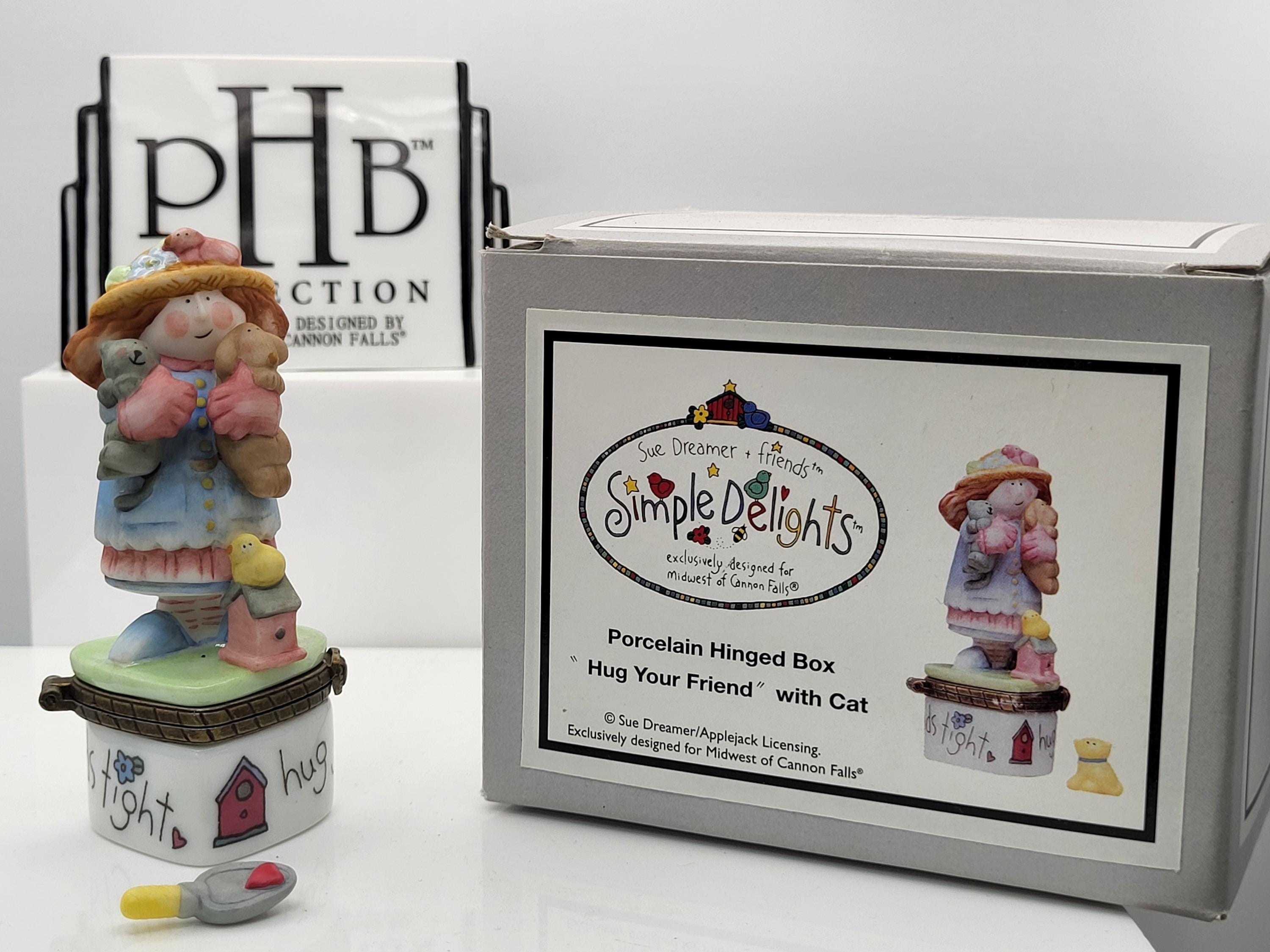 Simple delights by Sue dreamer and friends.Hug your friends trinket box with shovel trinket. Made by Midwest of Cannon Falls.
