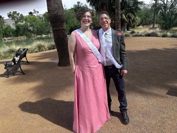 A couple celebrating their wedding day outdoors