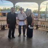 Edward with a couple after their ceremony