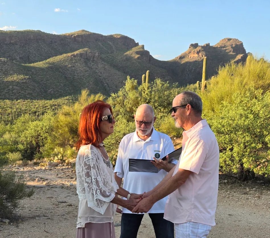 Edward officiating Vincent’s desert wedding ceremony