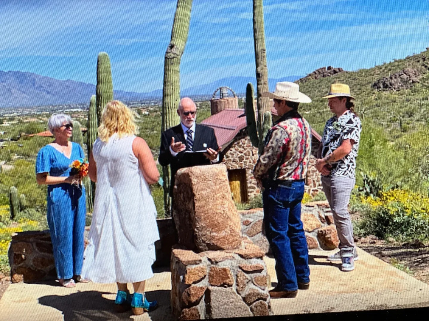 Edward officiating an outdoor ceremony at Sanctuary Cove