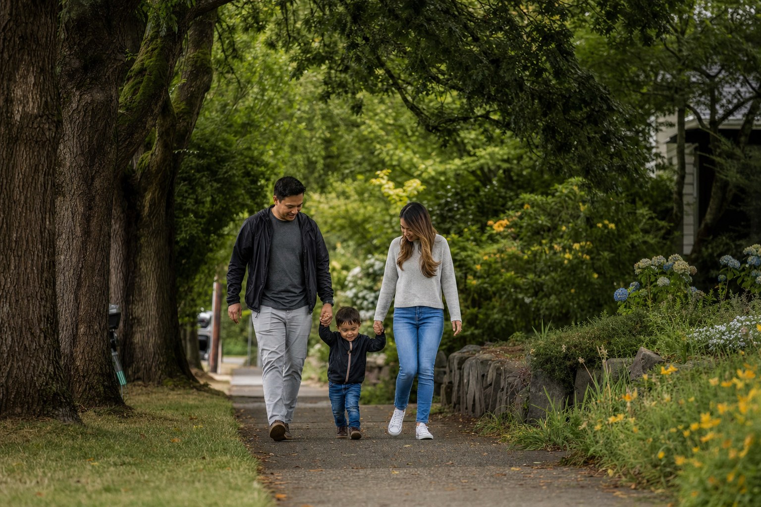 Family walking in a Pacific Northwest neighborhood
