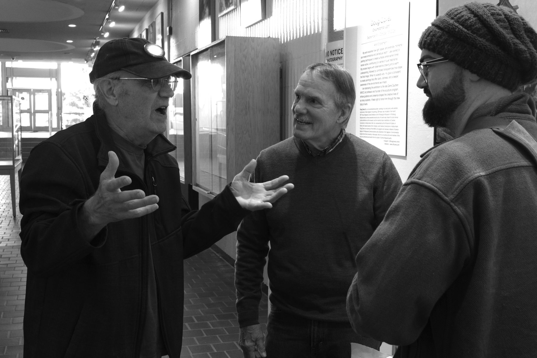 Guests in conversation at the Circumstantial Light exhibition