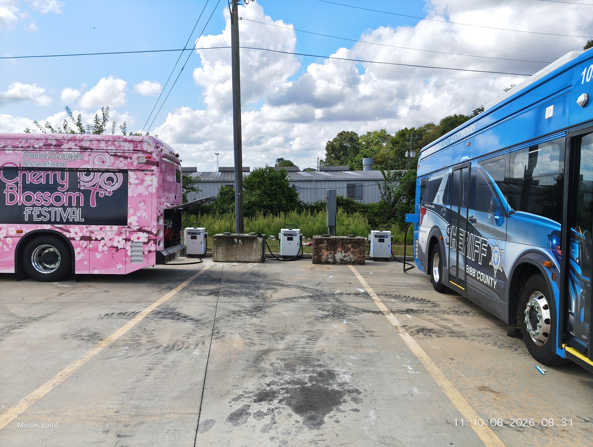 Electric vehicles connected to charging equipment at a public charging installation