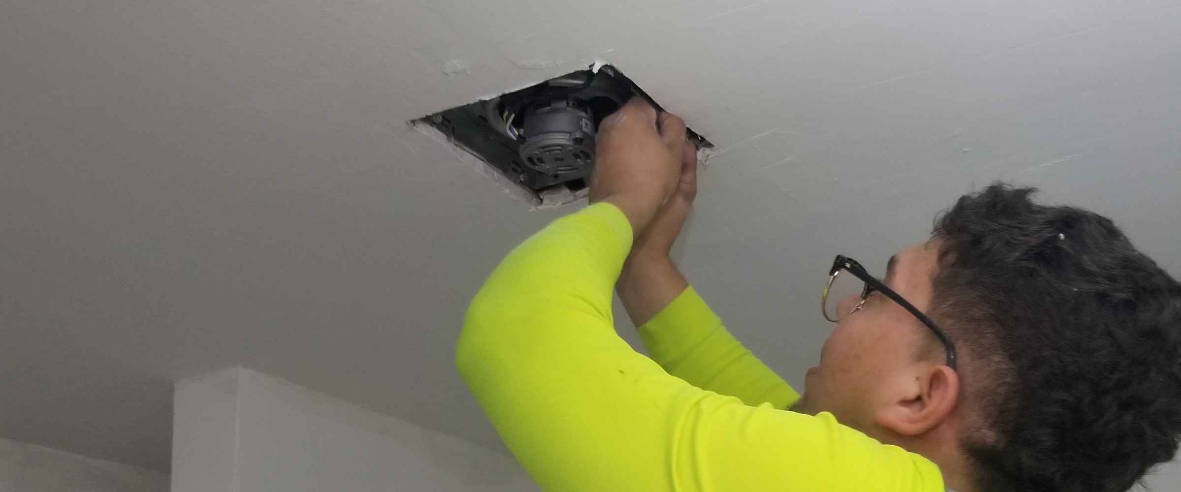 Electrician working on a residential electrical system