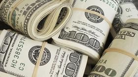 Rolled dollar bills for fundraising
