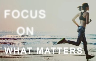 Runner by the water with the words Focus on What Matters