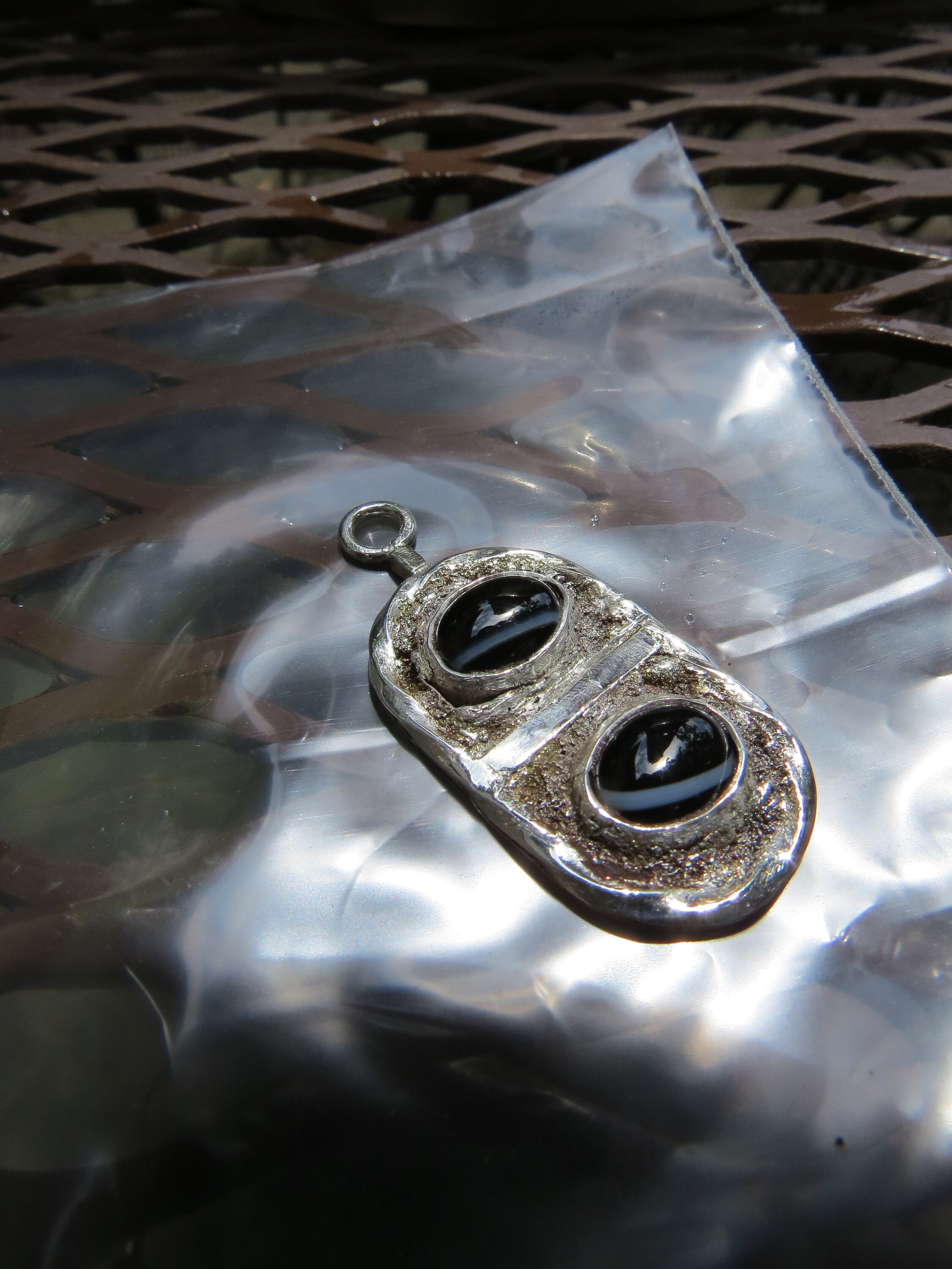 Sterling Silver Pendant with Black Agates.