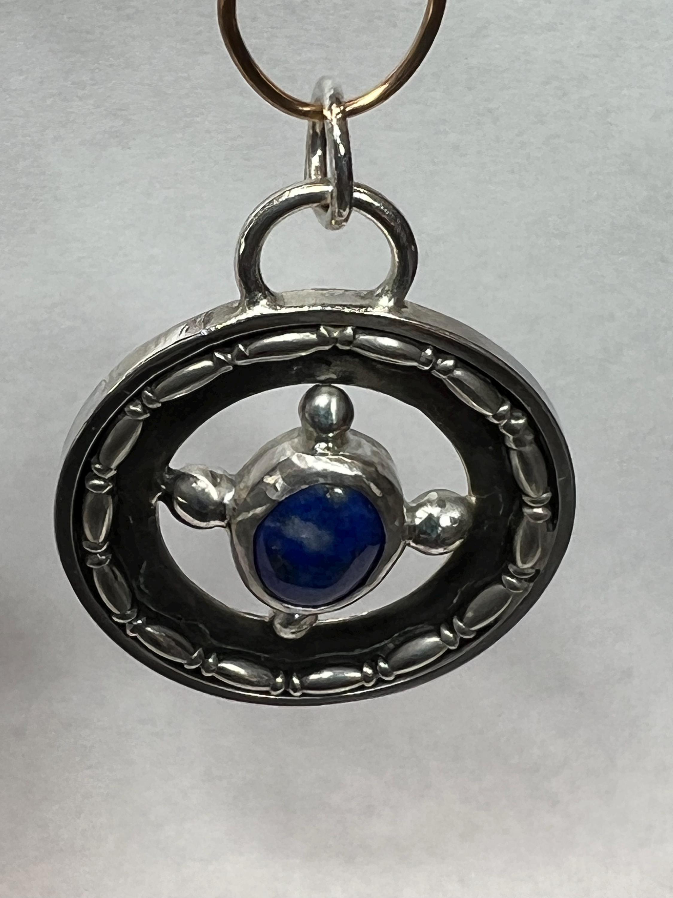 A Round Lapis Lazuli Good Luck Charm