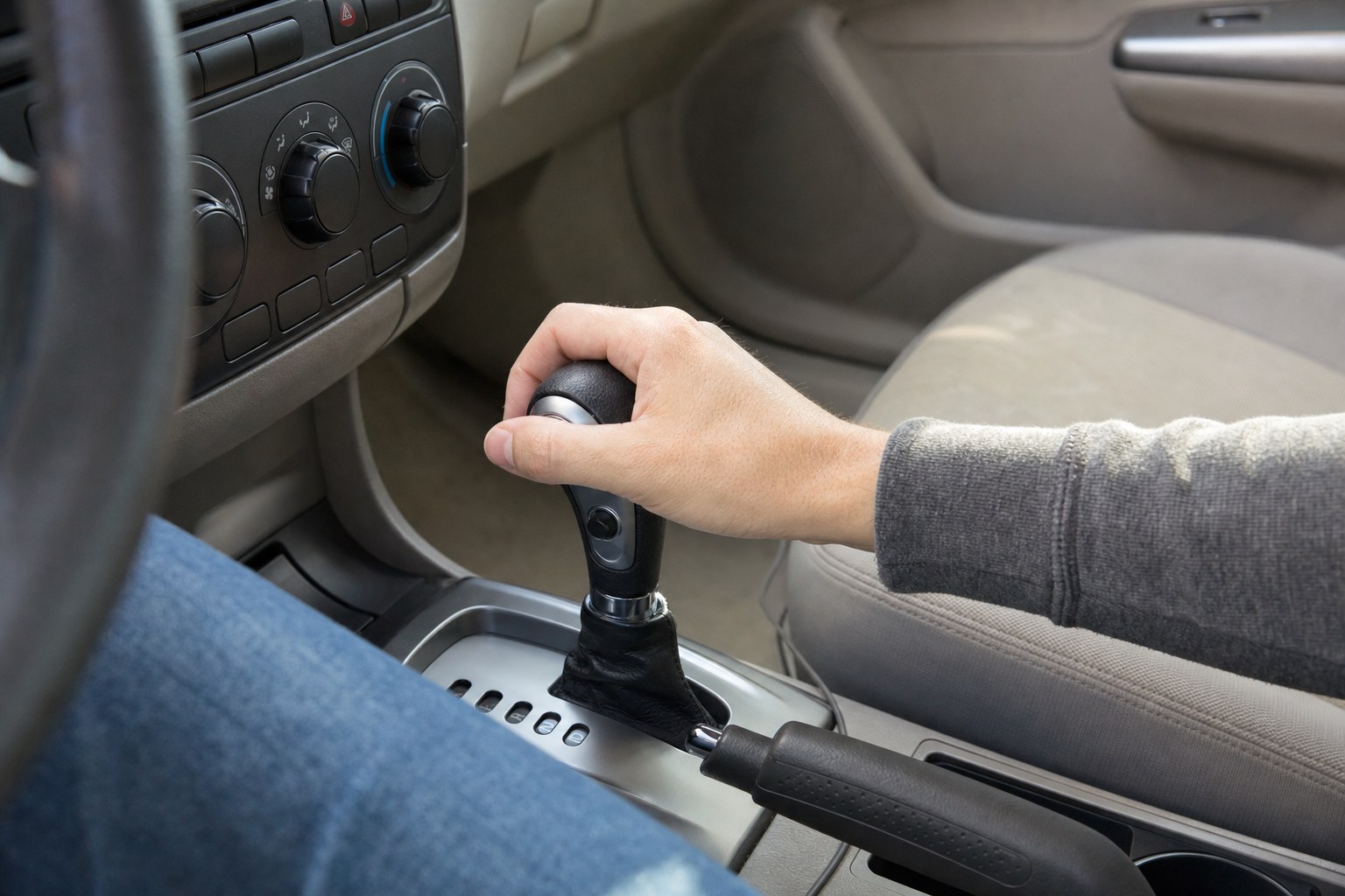 Driver moving an automatic car's gear selector during a no-start check