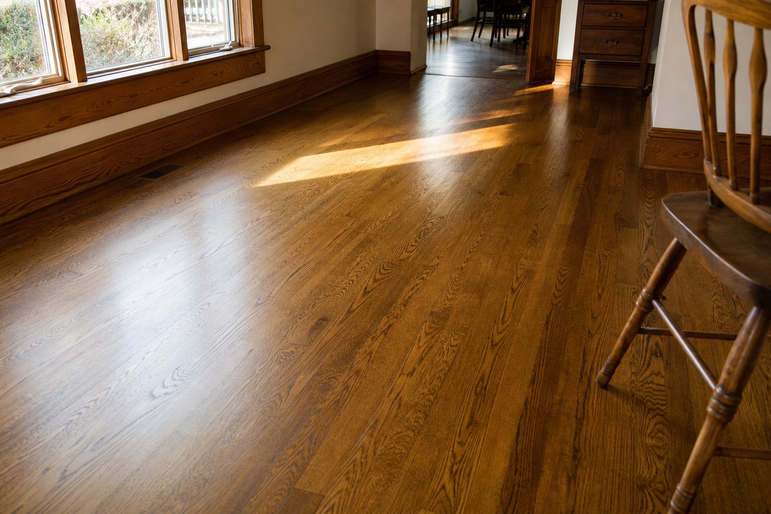 Warm hardwood flooring in a lived-in home