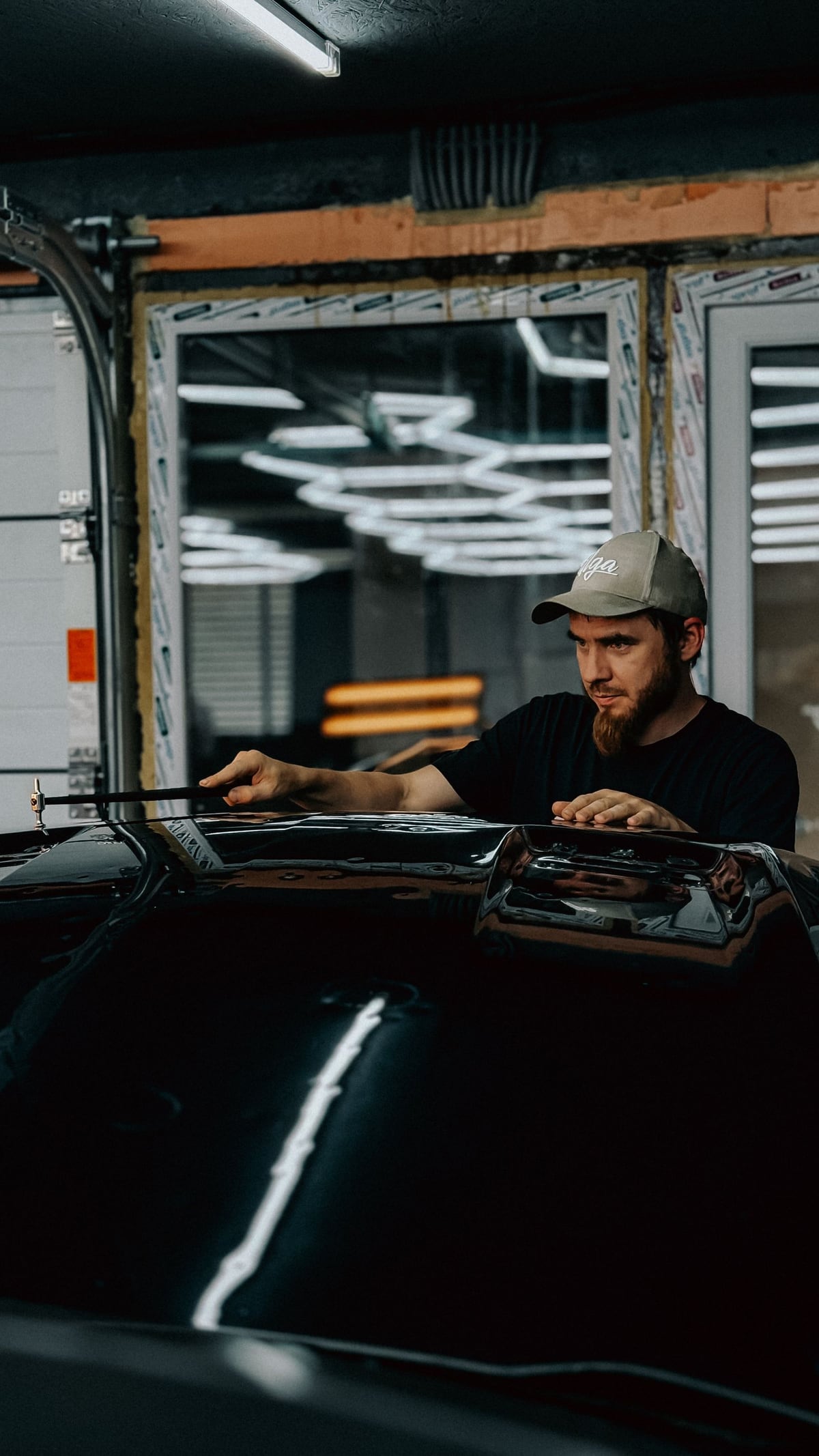 Auto technician working on a vehicle