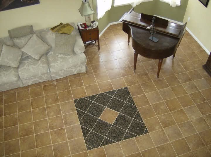 A contrasting diamond tile accent in a tiled living space.