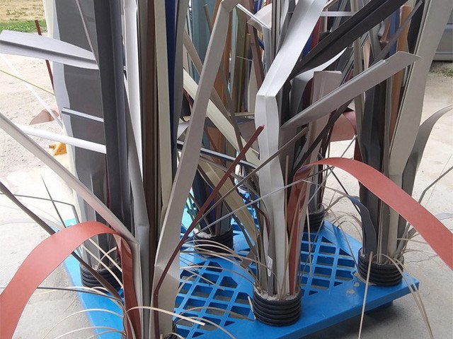 Close-up of varied flat Fishiding limbs on a modular habitat assembly