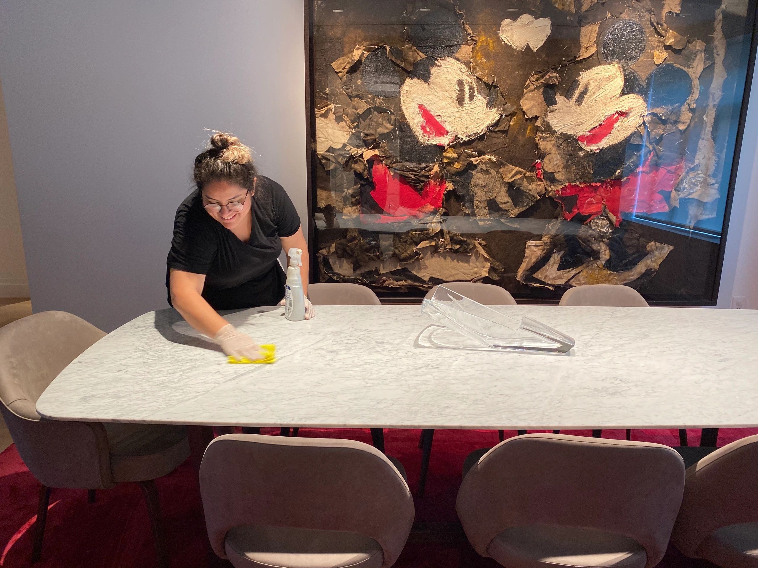 Loyola Pro cleaner detailing a dining table