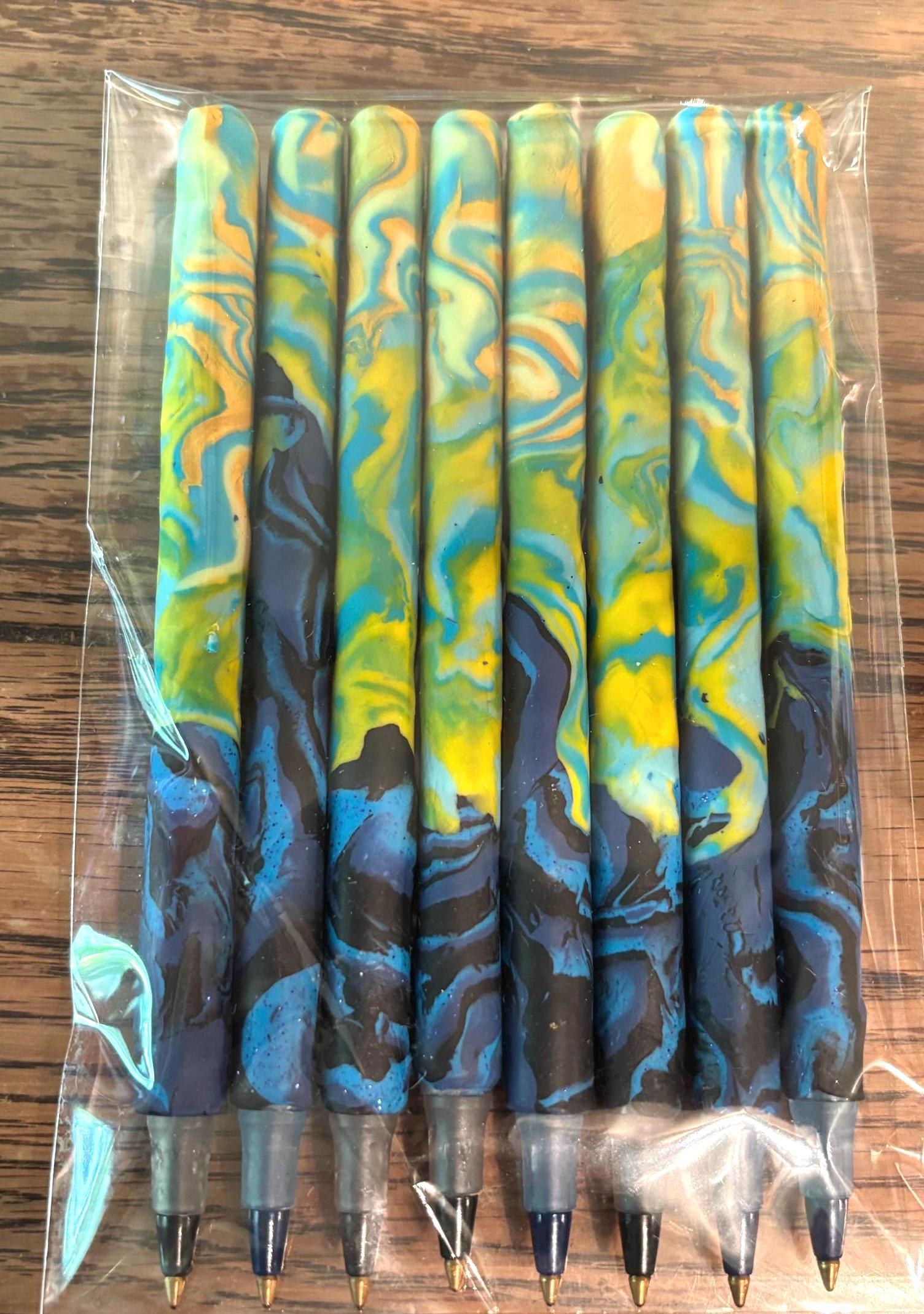 A handmade polymer clay pen for writing reflections and prayers